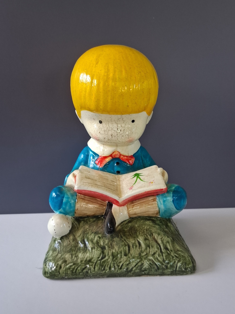 Yellow-Head Boy Reading Ceramic Figurine - Home Art Decor